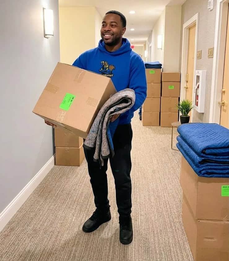 A man carrying Box